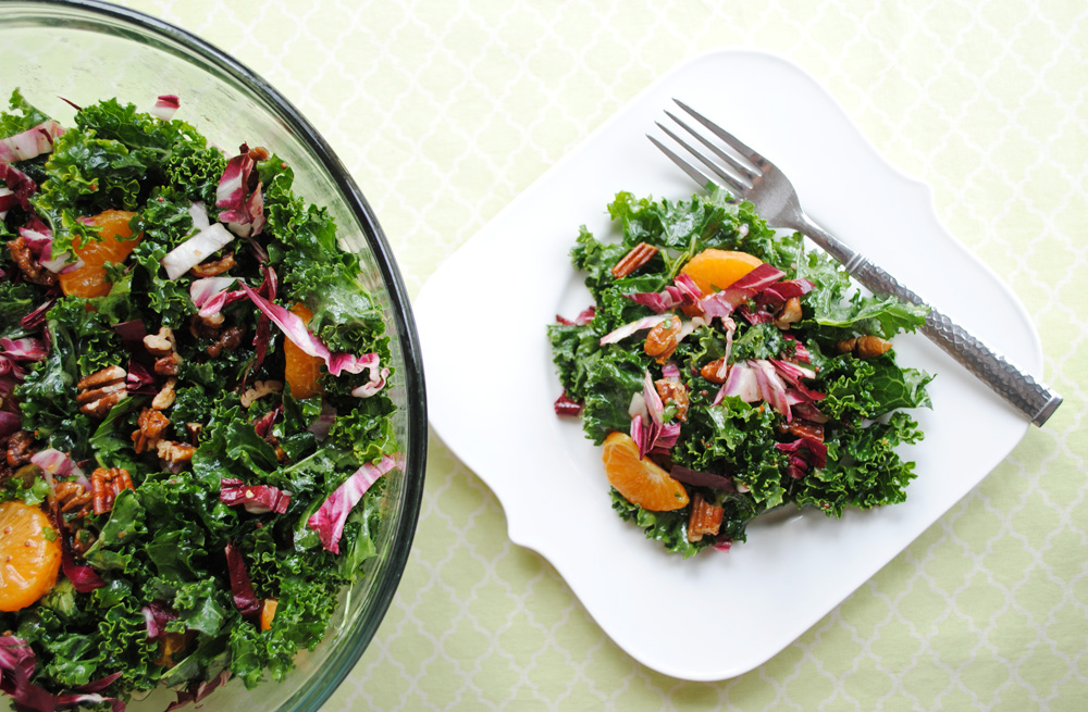 Delicious, fruity kale salad with mandarin oranges, cranberries, and candied pecans | www.thatwasvegan.com